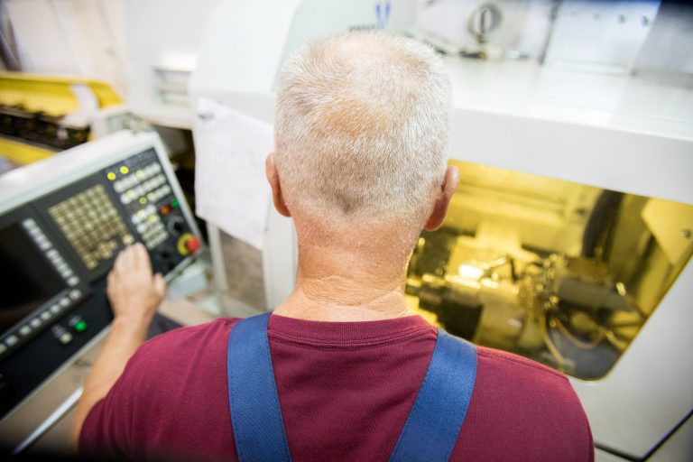 Engineer at lathe